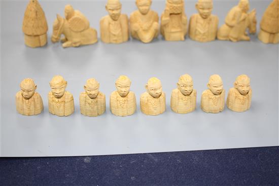 An East African carved wood chess set, kings 5cm, in carved hardwood box, possibly from The Cameroon